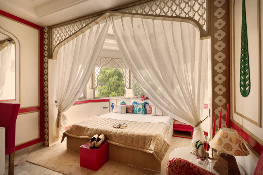 Mughal heritage room with 180 degree city view from Designer bed